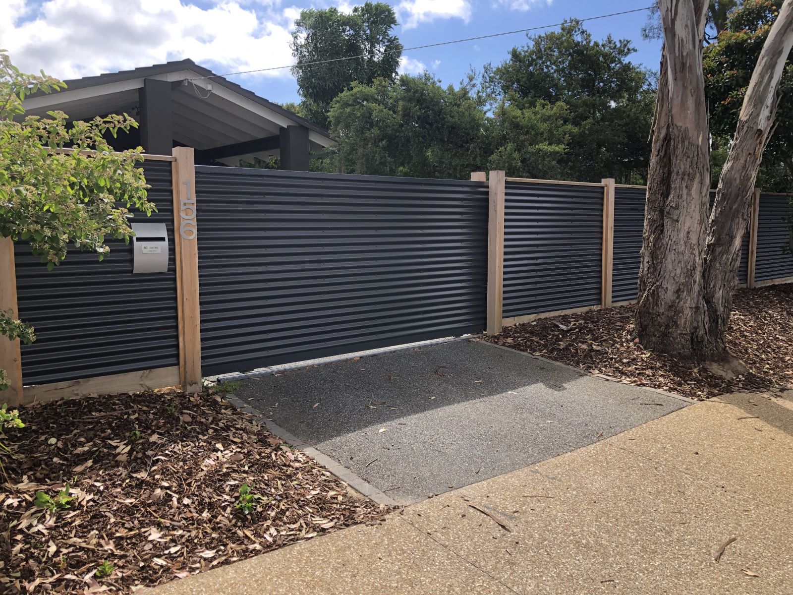 Durable Colorbond fencing in classic grey color, providing privacy and security for your property