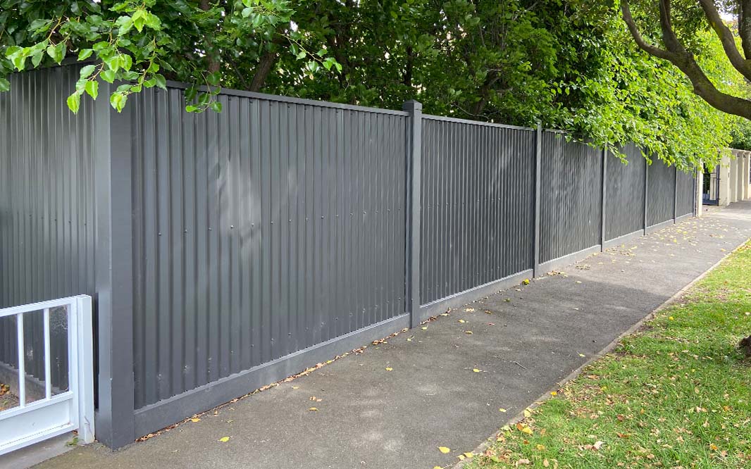 Sleek Colorbond fence in timeless white hue, offering a modern and clean look to your outdoor space