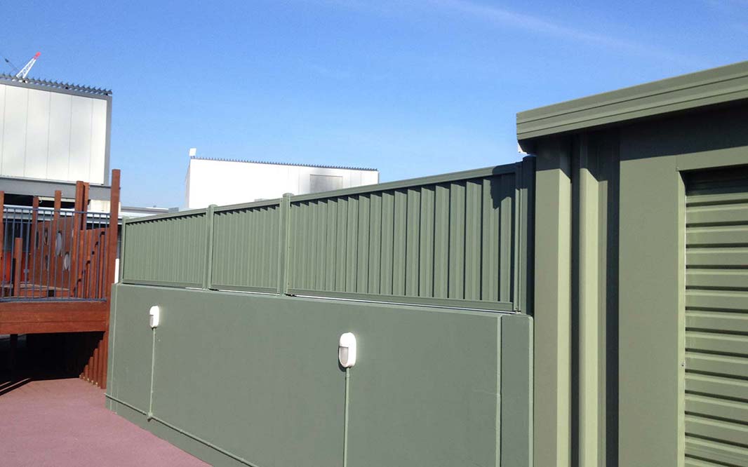 A modern Colorbond fence in slate gray, providing privacy and security to the property